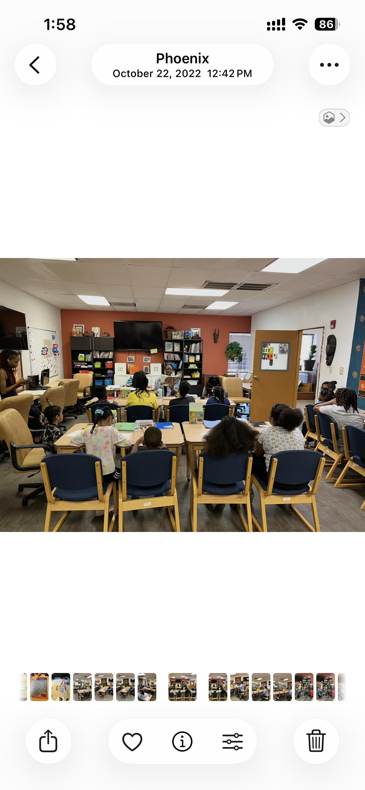 Kimberly T. Smith reading to children in a classroom